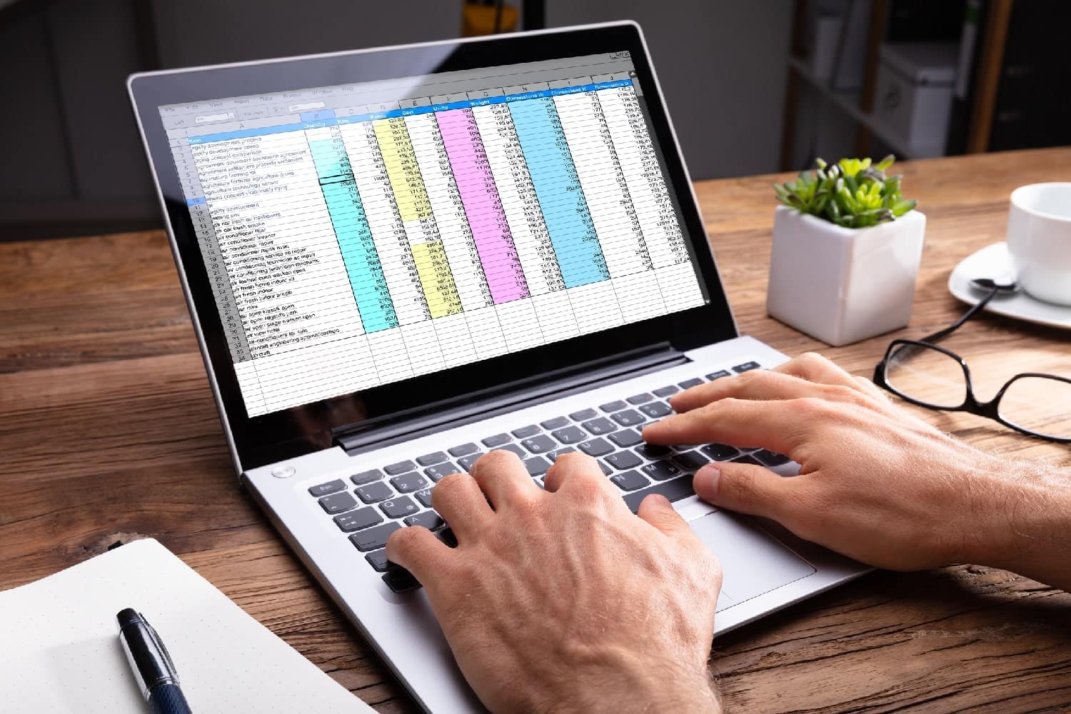 man-using-typing-in-laptop-notebook-spreadsheet-excel